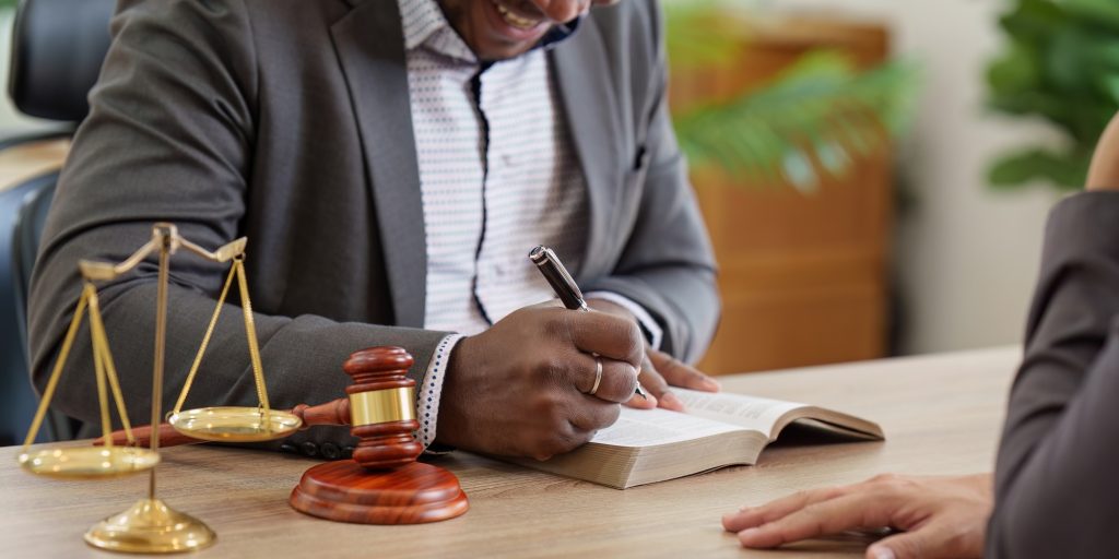 American African Lawyers advice to client about agreement contract. Law, legal services, advice
